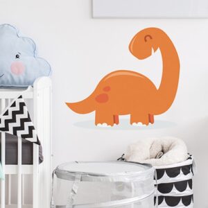 Sticker Dinosaure orange pour enfant mis en ambiance dans une chambre de bébé