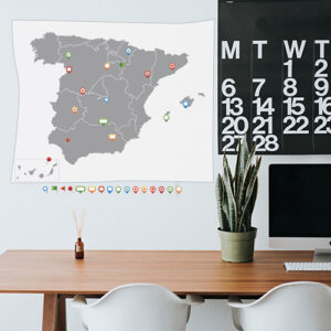 Autocollants "carte d'Espagne" disposés sur mur de bureau